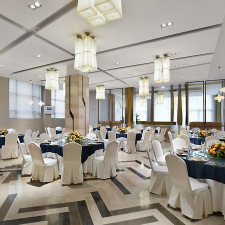 Holiday Inn Express Chengdu Huanhuaxi By Ihg-Near Jinsha Site Musem,Near Wuhou Temple Museum,Welcome Drinks,Free Gym,Free Self-Service Laundry Чънду Екстериор снимка